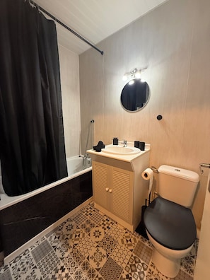 Hair dryer, towels, soap, toilet paper