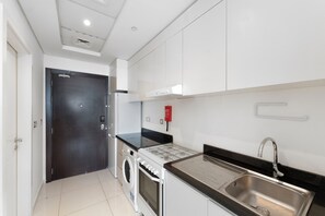 Studio Confort, balcon, vue ville | Coin cuisine privé