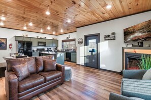 TV, fireplace - Luxury Cabin w/ Hot Tub, Game Room & Fire Pit — Close to Parkway & Dollywood (Sevierville)
