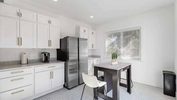 Coffee/tea maker, fridge, microwave, oven