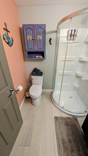 Shower, hair dryer, towels, soap