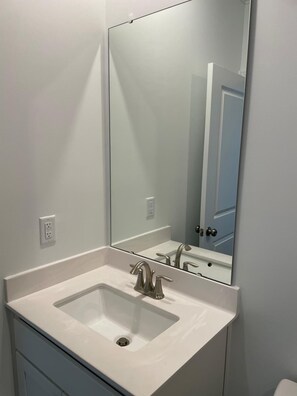 Shower, towels, soap, toilet paper - 4BR Knightdale Home • Fast Wi-Fi • Near Downtown Raleigh (Knightdale)