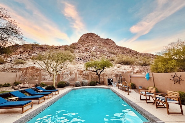 Mountain view backyard oasis- the sun rises over the mountain