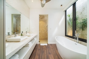 Shower, hair dryer, towels, soap