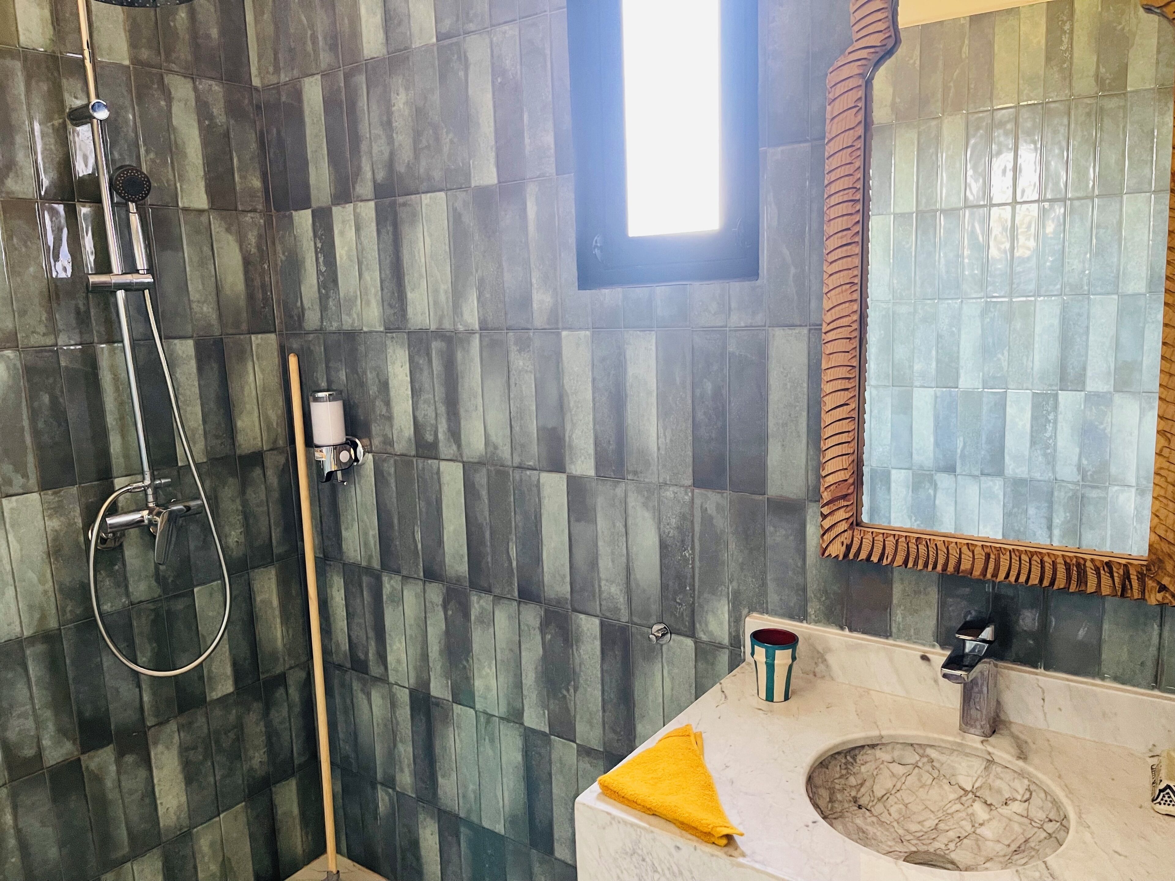 Shower, towels, soap, toilet paper