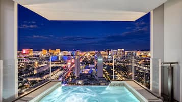 Penthouse with infinity-edge 1400ft² wrap-around balcony & hot tub.