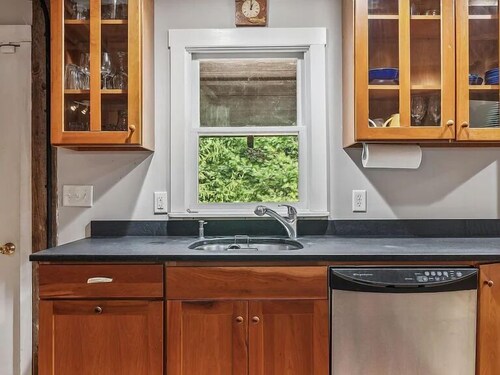 The Greenwood Cabin 
A cozy 3 bedroom retreat with sauna and hot tub!