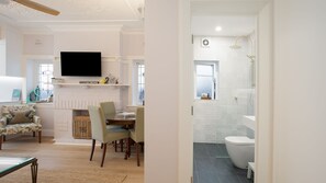 Shower, hair dryer, towels
