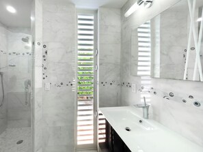 Shower, hair dryer, towels, soap