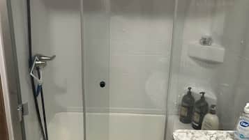 Hair dryer, towels, soap, toilet paper