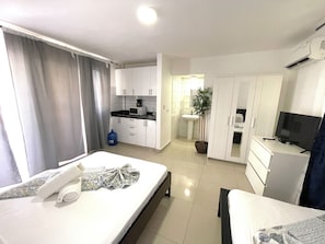 Deluxe Studio, Balcony, Pool View | In-room safe, free WiFi