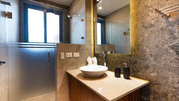 Shower, towels, soap, toilet paper