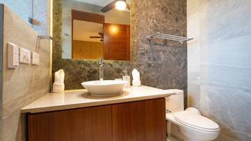 Shower, towels, soap, toilet paper