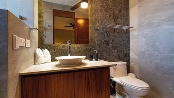 Shower, towels, soap, toilet paper