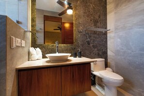 Shower, towels, soap, toilet paper