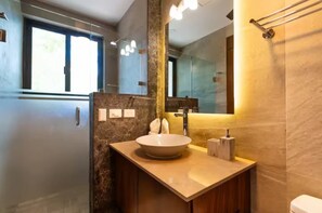 Shower, towels, soap, toilet paper