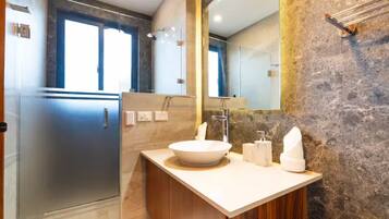 Shower, towels, soap, toilet paper