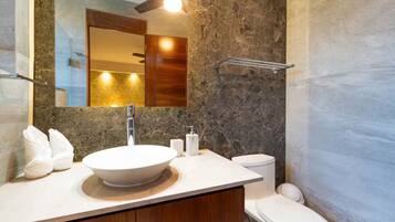 Shower, towels, soap, toilet paper