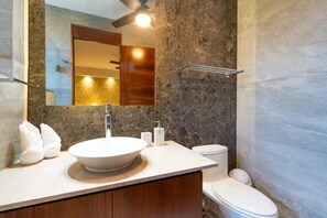 Shower, towels, soap, toilet paper