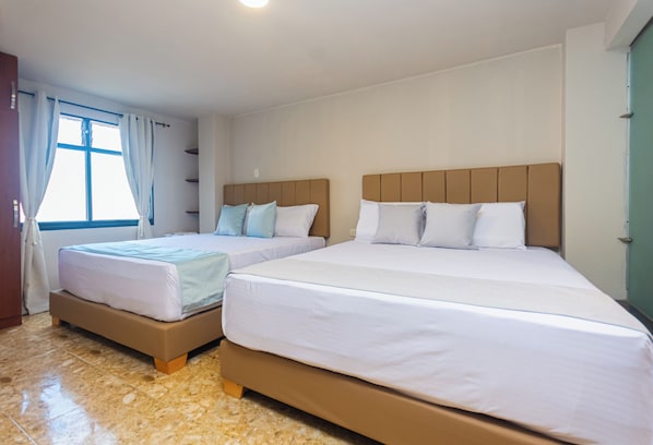 Standard Quadruple Room, 2 Queen Beds | Free WiFi