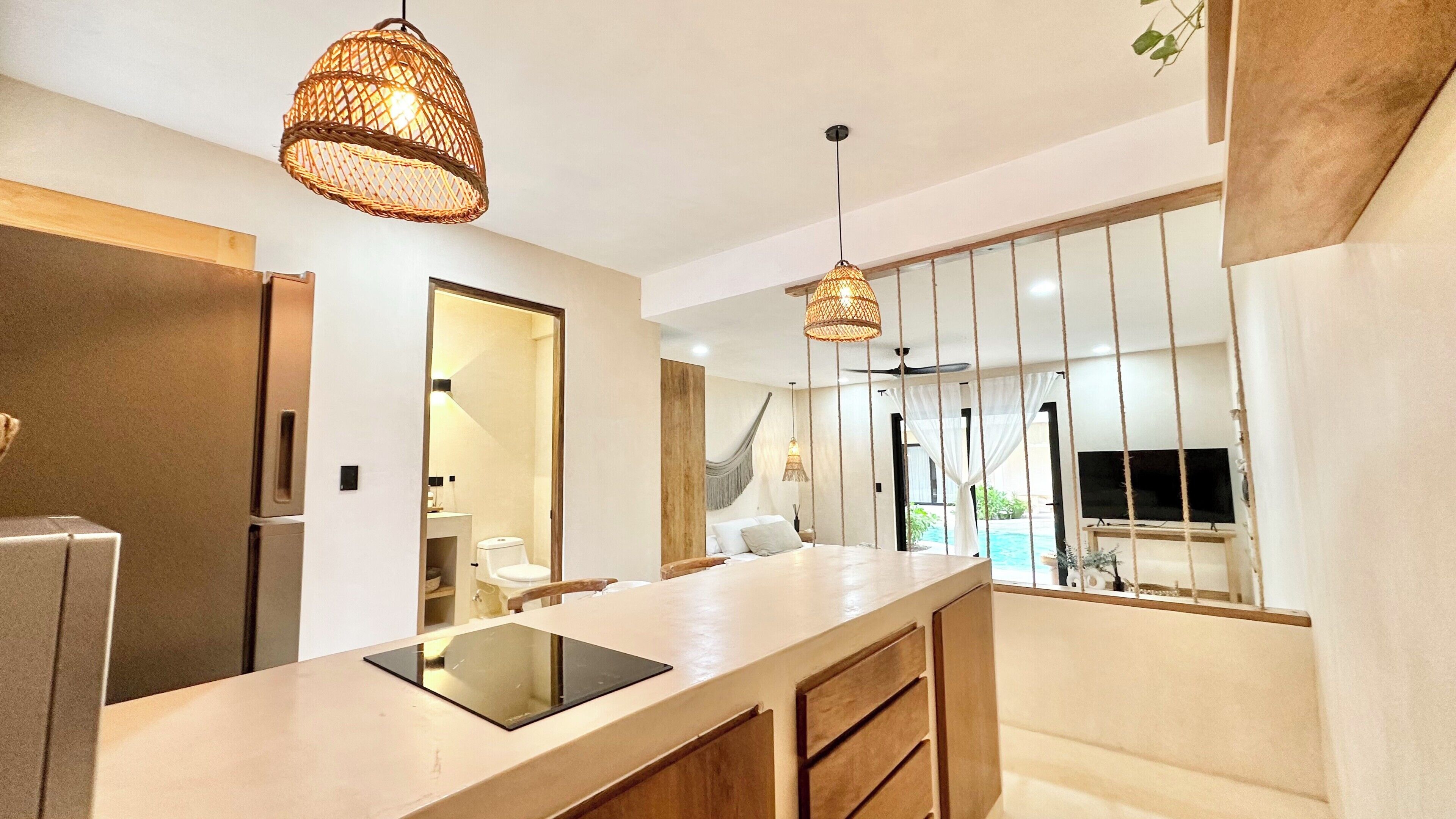 Luxury Apartment, Pool View | Private kitchen | Microwave, stovetop, cookware/dishes/utensils