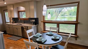 Fridge, microwave, oven, stovetop - Swan Shores - Lakefront home in Wichita (Wichita)