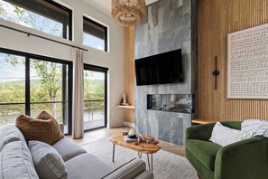 TV, fireplace, offices - Exhale | Romantic Lakefront Chalet w/ Hot Tub (Basye)