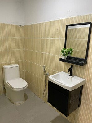 Economy Double Room | Bathroom | Slippers