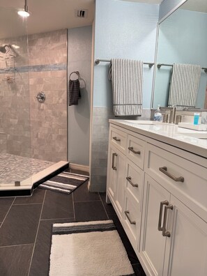 Shower, hair dryer, towels, soap
