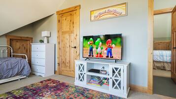 Iron/ironing board, travel crib, free WiFi, bed sheets