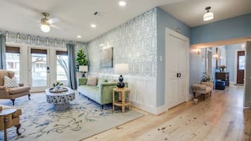 Smart TV, fireplace, foosball, books