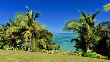 On the beach, sun-loungers, beach towels