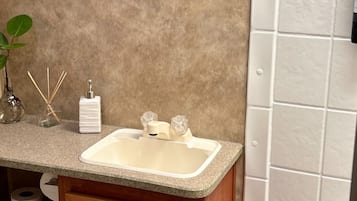 Hair dryer, towels, soap, toilet paper