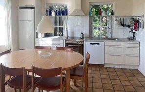 Fridge, stovetop, dishwasher, coffee/tea maker