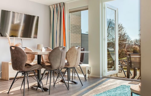 Nice home in Makkum with lake view