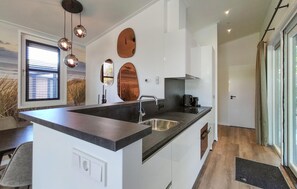 Fridge, microwave, dishwasher, coffee/tea maker