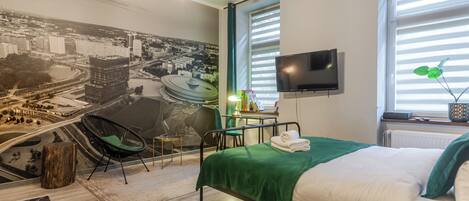 Een strijkplank/strijkijzer, wifi, beddengoed