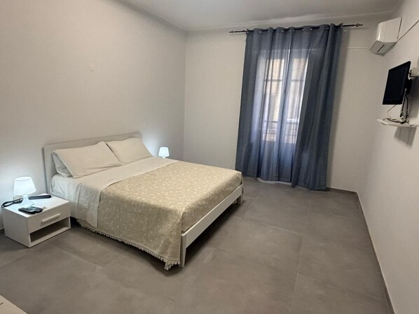 1 bedroom, desk, iron/ironing board, travel cot