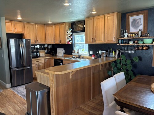 Charming, dog-friendly, 2-bedroom house in Three Forks with AC and fenced yard.