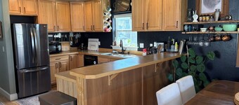 Charming, dog-friendly, 2-bedroom house in Three Forks with AC and fenced yard.