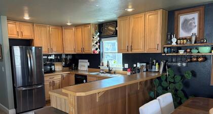 Charming, dog-friendly, 2-bedroom house in Three Forks with AC and fenced yard.