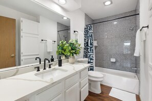 Hair dryer, towels, soap, shampoo