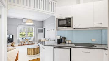 Microwave, stovetop, coffee/tea maker, toaster