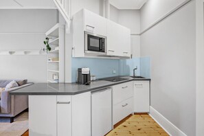 Microwave, stovetop, coffee/tea maker, toaster