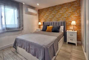 2 chambres, coffre-fort, fer et planche à repasser, lit de bébé portatif