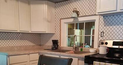 Charming Lakeside 2-bedroom log cabin on Caribou Lake, De Tour Village Michigan