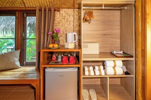 Bamboo Cottage | Bathroom | Shower, hair dryer, slippers, bidet