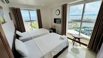 Căn hộ Deluxe, quang cảnh thành phố | Bàn, truy cập Internet không dây miễn phí, bộ trải giường