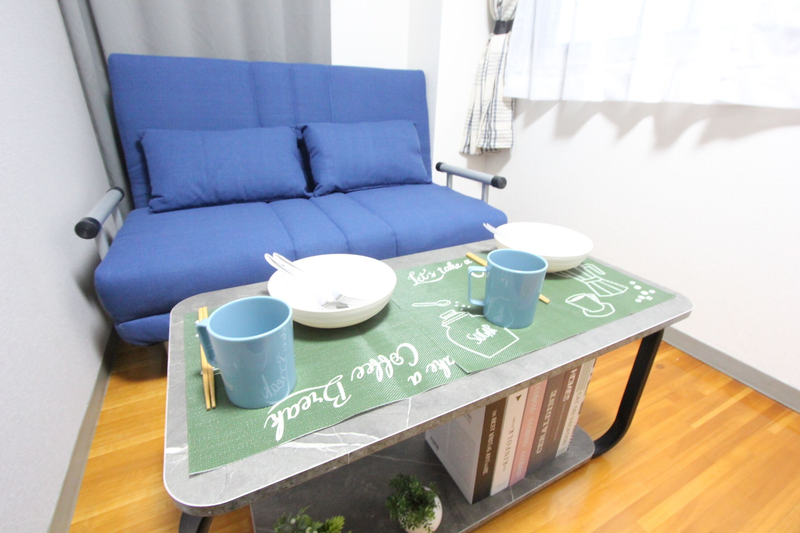 Chambre Triple Standard | Coin séjour