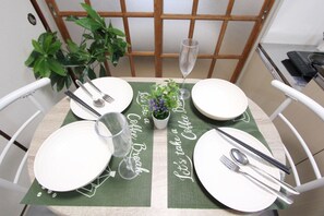 Habitación triple clásica | Zona de estar